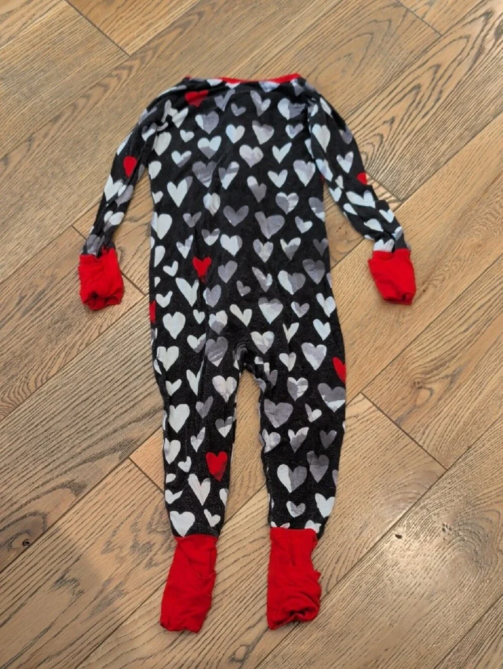 Little Sleepies Black Heart-Print Footed Pajamas with Red Trim